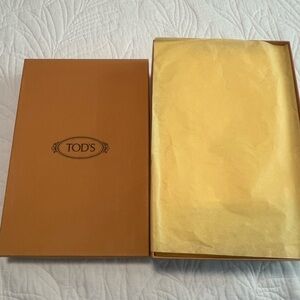 TOD’S, gorgeous crimson red sandals brand new in original box. Size 7-1/2.